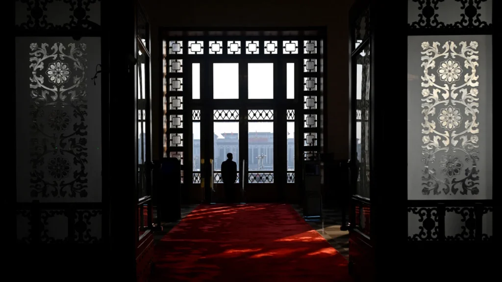 A-security-guard-watches-during-the-opening-session-of-the-National-Peoples-Congress-NPC