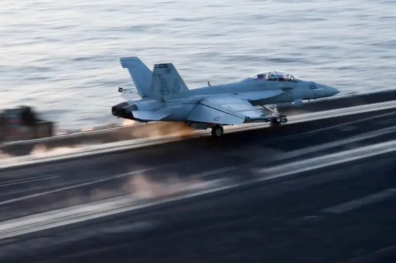 An-aircraft-launching-from-the-USS-Harry-S-Truman-in-the-Red-Sea-before-air-strikes-in-Sanaa-on-March-15-2025-US-Navy-via-AP