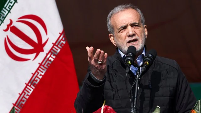 In this photo released by the Iranian Presidency Office, President Masoud Pezeshkian speaks during a rally commemorating anniversary of 1979 Islamic Revolution that toppled the late pro-U.S. Shah Mohammad Reza Pahlavi and brought Islamic clerics to power, in Tehran, Iran. (Iranian Presidency Office via AP, file)