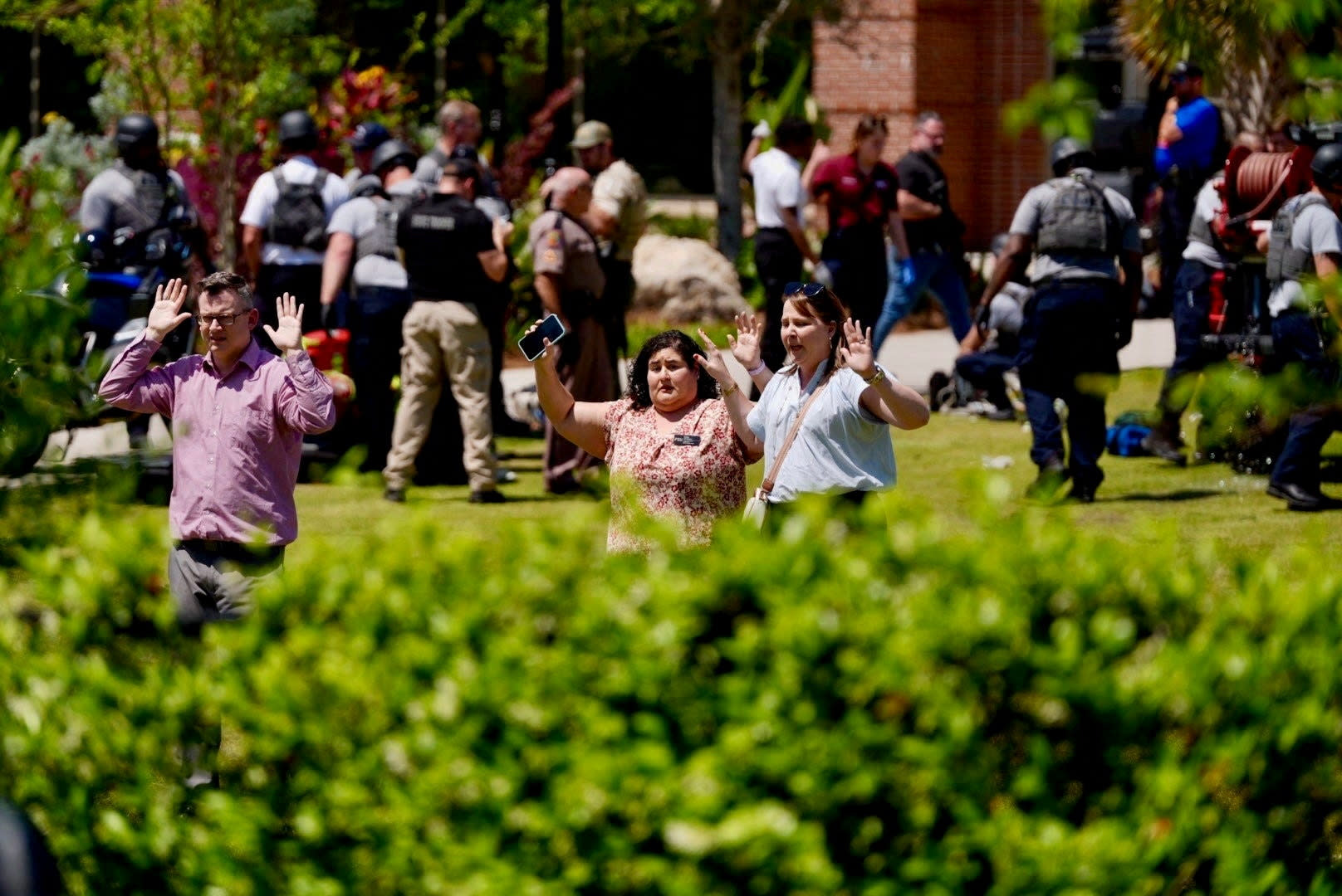People evacuate after a shooting at Florida State University in Tallahassee, Fla